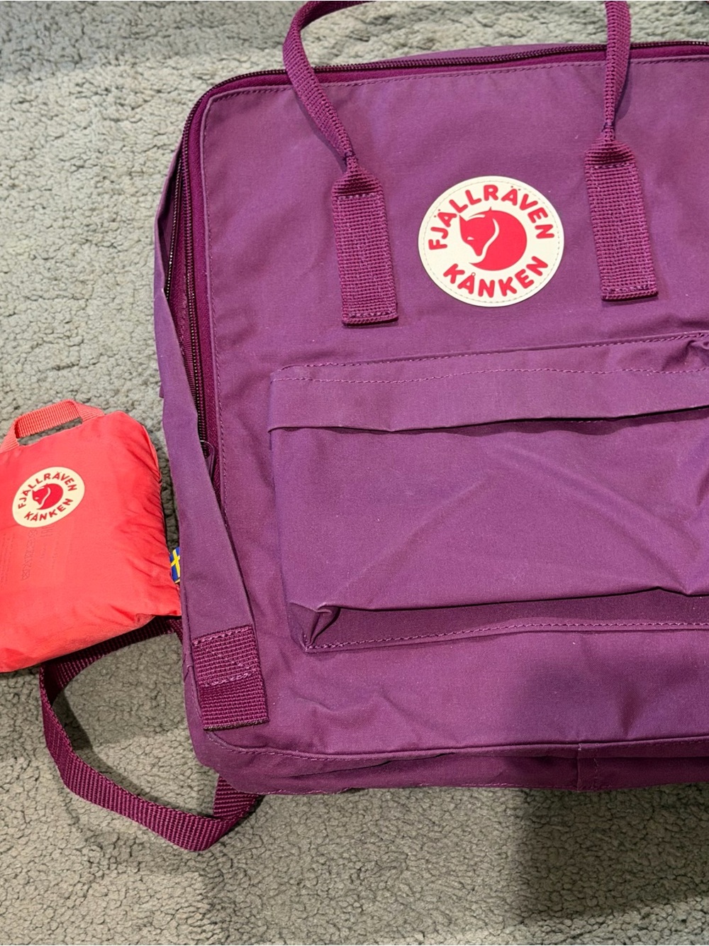 Fjallraven Kanken Backpack in Plum Purple with Red Logo and kanken rain cover